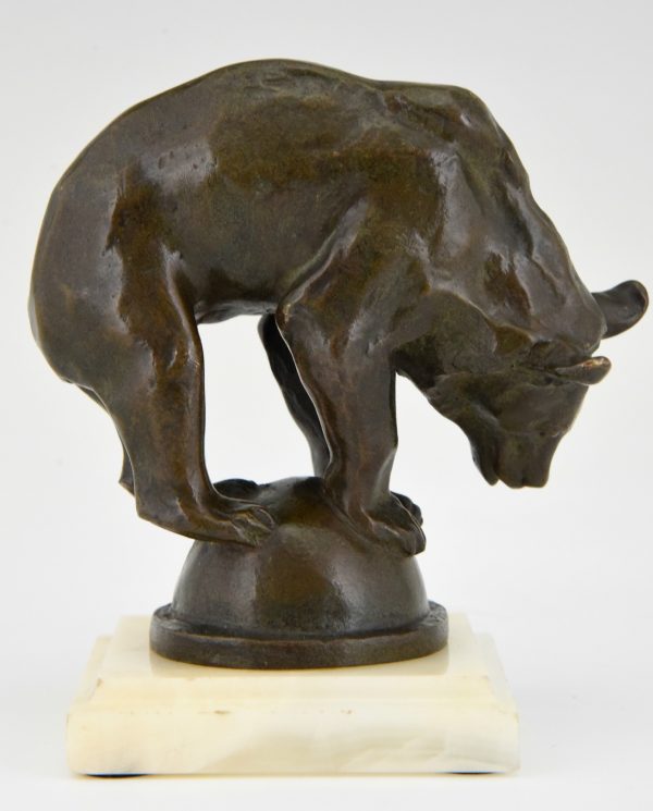 Art Deco bronze sculpture of a bear on a ball