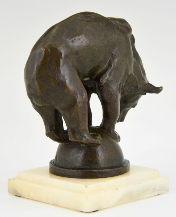 Art Deco bronze sculpture of a bear on a ball