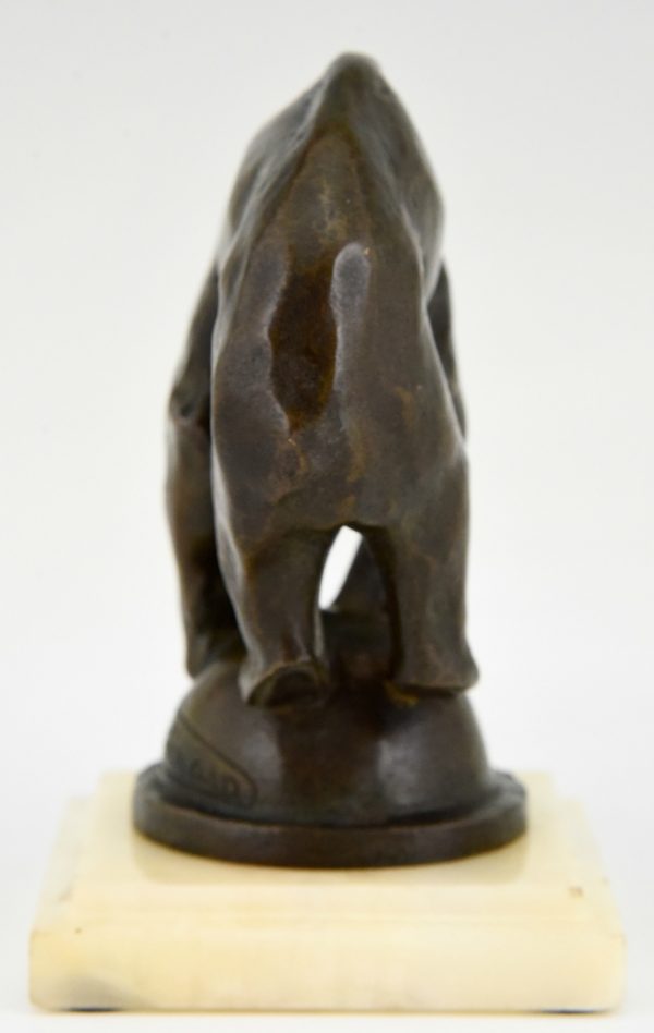 Art Deco bronze sculpture of a bear on a ball