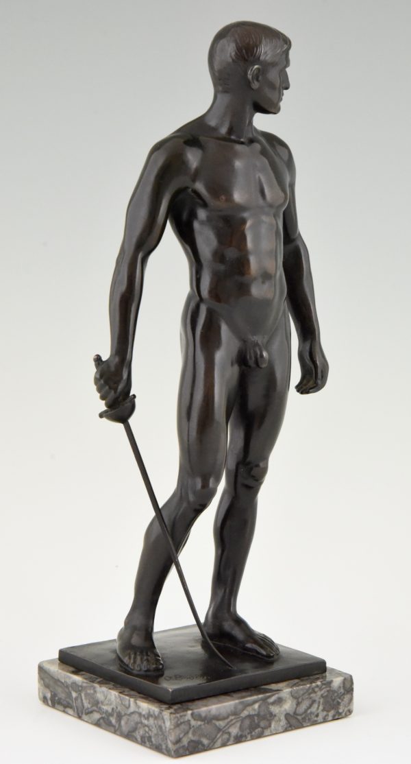 Antique bronze sculpture of a standing male nude fencer.