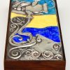 Sterling silver and enamel box with man smoking water pipe.