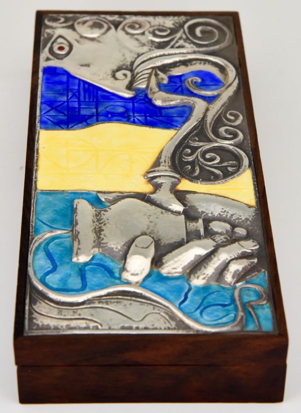 Sterling silver and enamel box with man smoking water pipe.