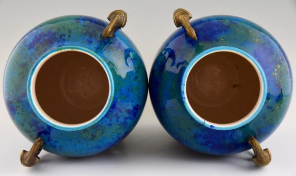 Pair of Art Deco blue ceramic and bronze vases