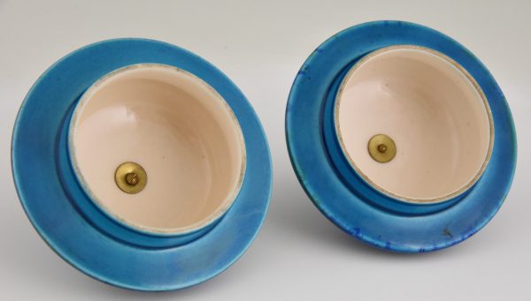 Pair of Art Deco blue ceramic and bronze vases