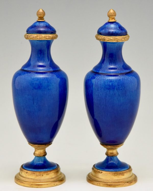 Pair of blue ceramic and bronze vases or urns