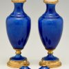 Pair of blue ceramic and bronze vases or urns