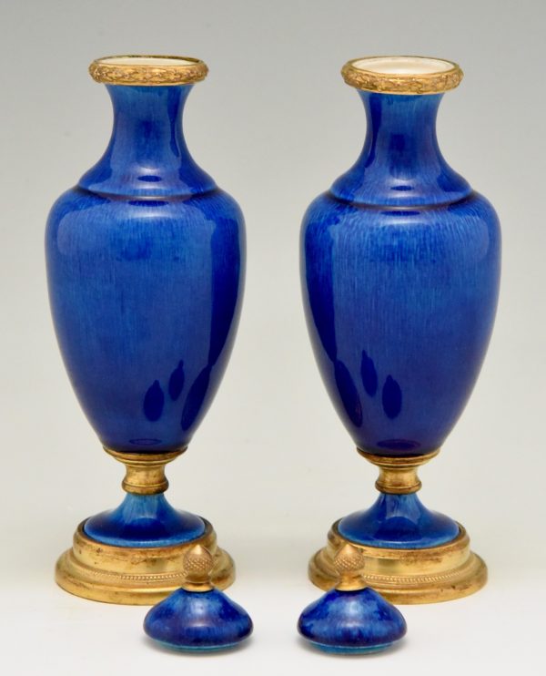 Pair of blue ceramic and bronze vases or urns