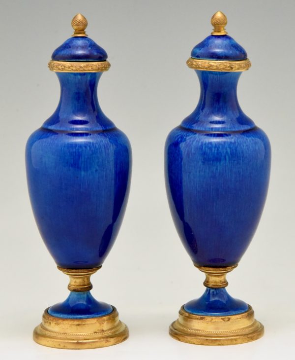 Pair of blue ceramic and bronze vases or urns