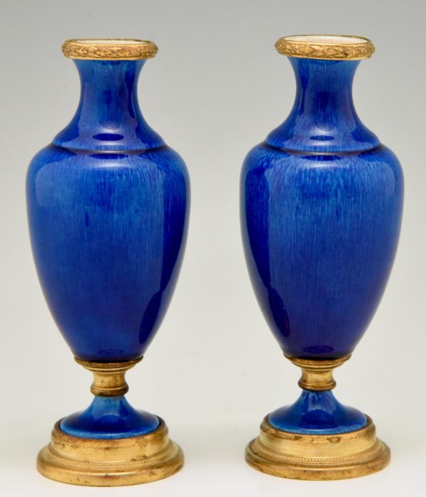 Pair of blue ceramic and bronze vases or urns