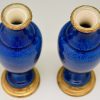 Pair of blue ceramic and bronze vases or urns