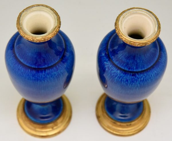 Pair of blue ceramic and bronze vases or urns