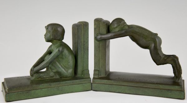 Art Deco bronzen boekensteunen jonge saters