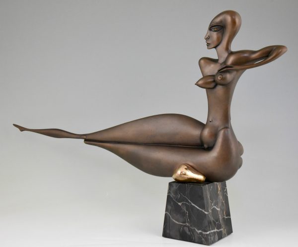 Modern bronze sculpture of a nude.