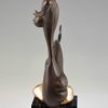 Modern bronze sculpture of a nude.