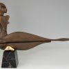 Modern bronze sculpture of a nude.