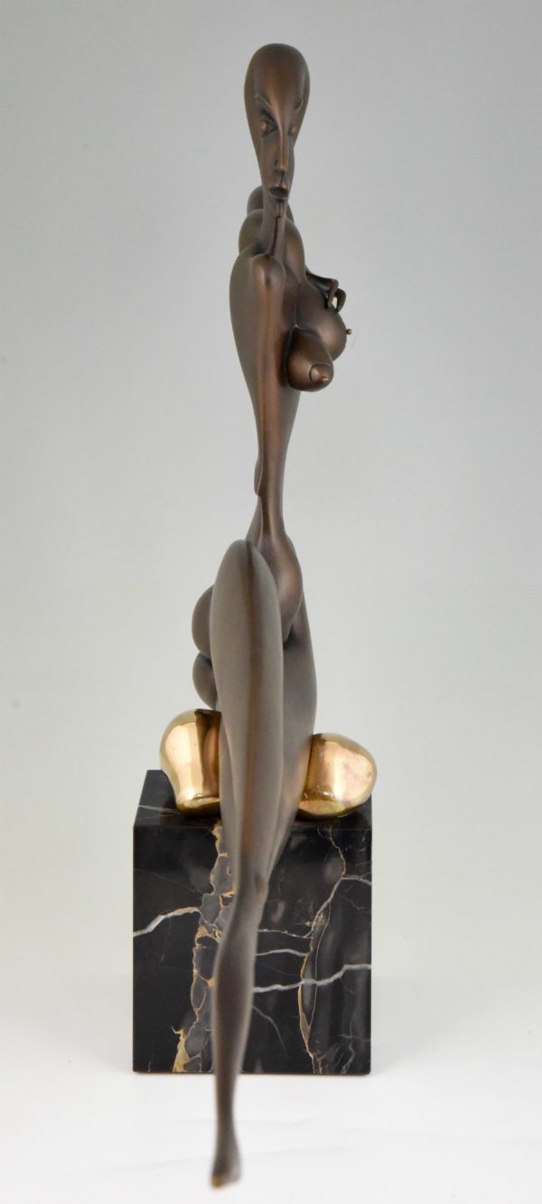 Modern bronze sculpture of a nude.