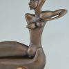 Modern bronze sculpture of a nude.