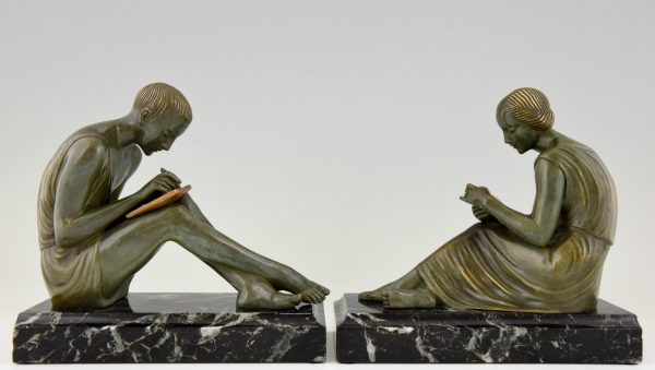 Art Deco bronze bookends man writing, lady reading