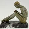 Art Deco Bronze Buchstütze Mann und Frau mit Brief.