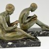 Art Deco bronze bookends man writing, lady reading