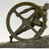 Art Deco bronze sculpture athlete pushing a wheel Strength