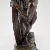 Art Deco bronze sculpture male nude pushing a wheel