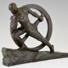 Art Deco bronze sculpture male nude pushing a wheel