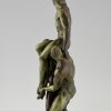 Art Deco sculpture of 3 athletes, male nudes.
