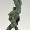 Art Deco sculpture of two athletes with laurel wreath