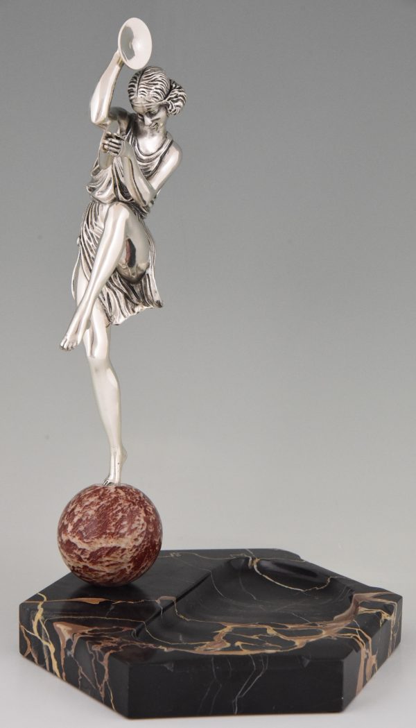 Art Deco silvered bronze cymbal dancer on marble tray