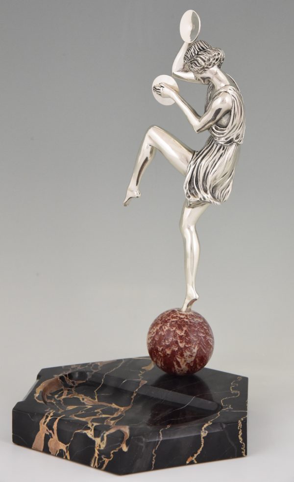 Art Deco silvered bronze cymbal dancer on marble tray