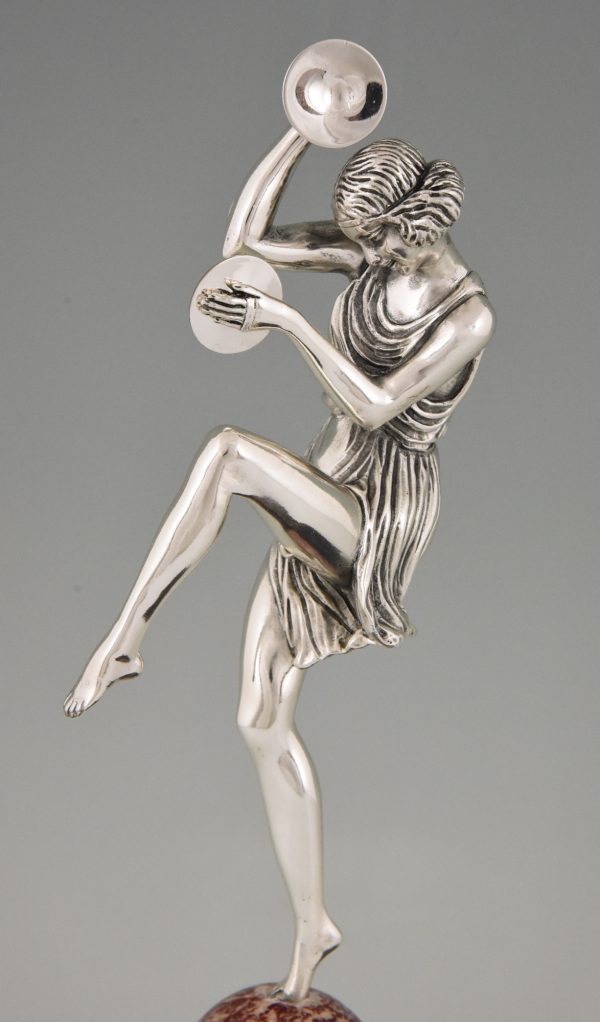 Art Deco silvered bronze cymbal dancer on marble tray