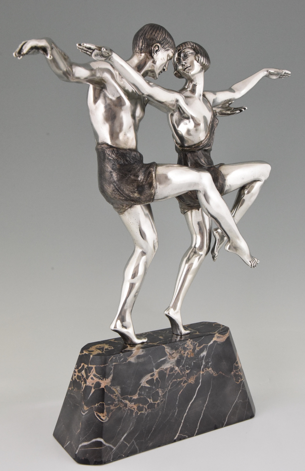 Art Deco silvered bronze sculpture of a dancing couple. Art Deco silvered bronze sculpture of a dancing couple.