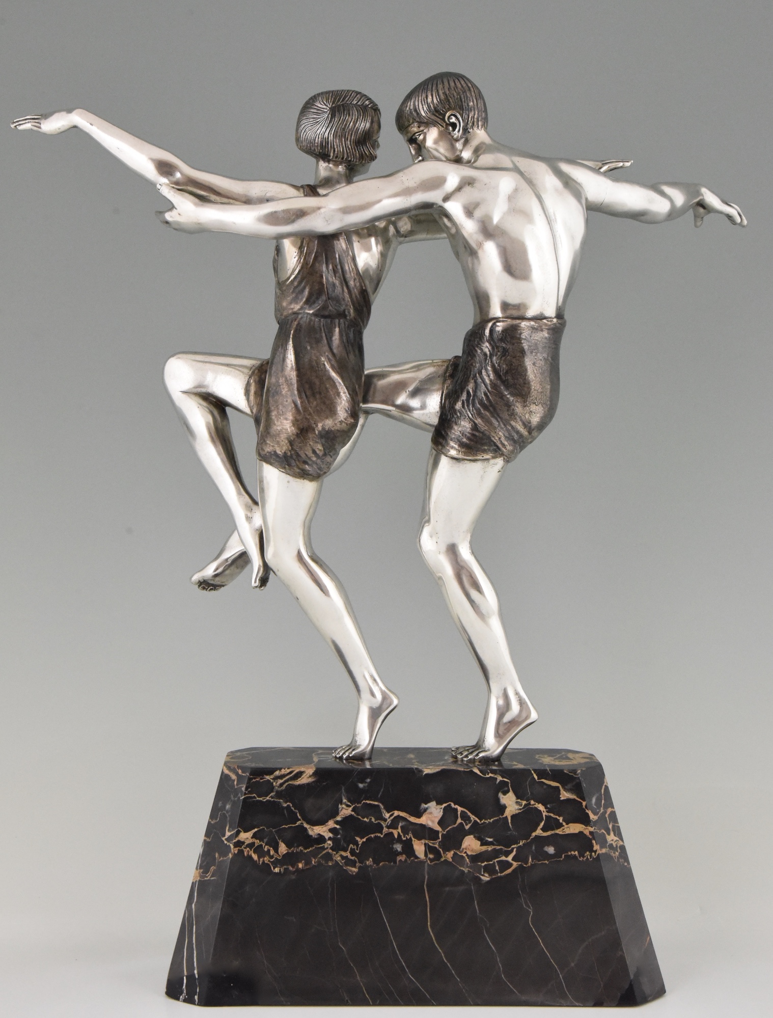 Art Deco silvered bronze sculpture of a dancing couple. Art Deco silvered bronze sculpture of a dancing couple.