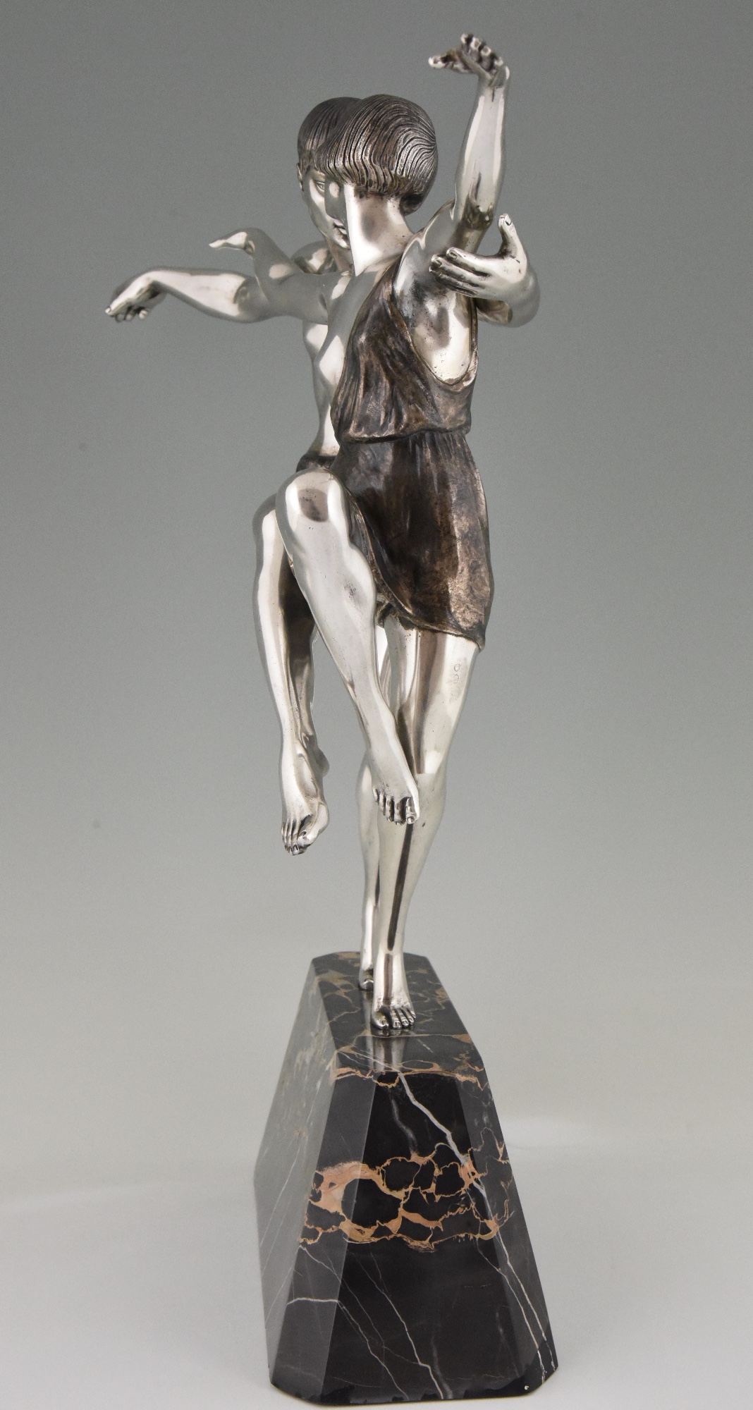Art Deco silvered bronze sculpture of a dancing couple. Art Deco silvered bronze sculpture of a dancing couple.