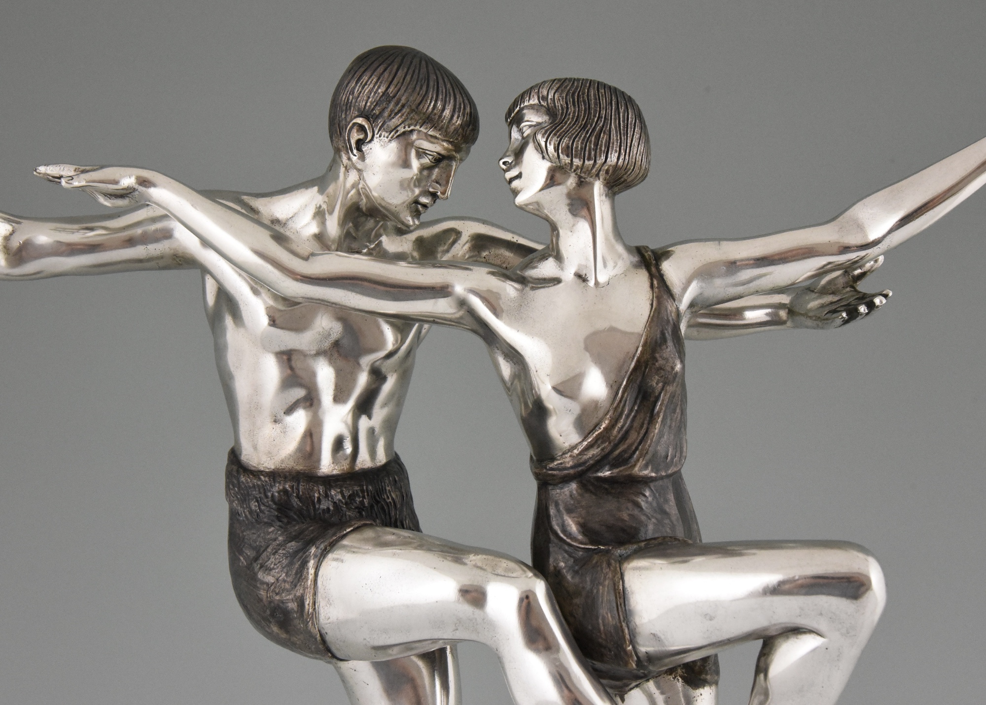 Art Deco silvered bronze sculpture of a dancing couple. Art Deco silvered bronze sculpture of a dancing couple.
