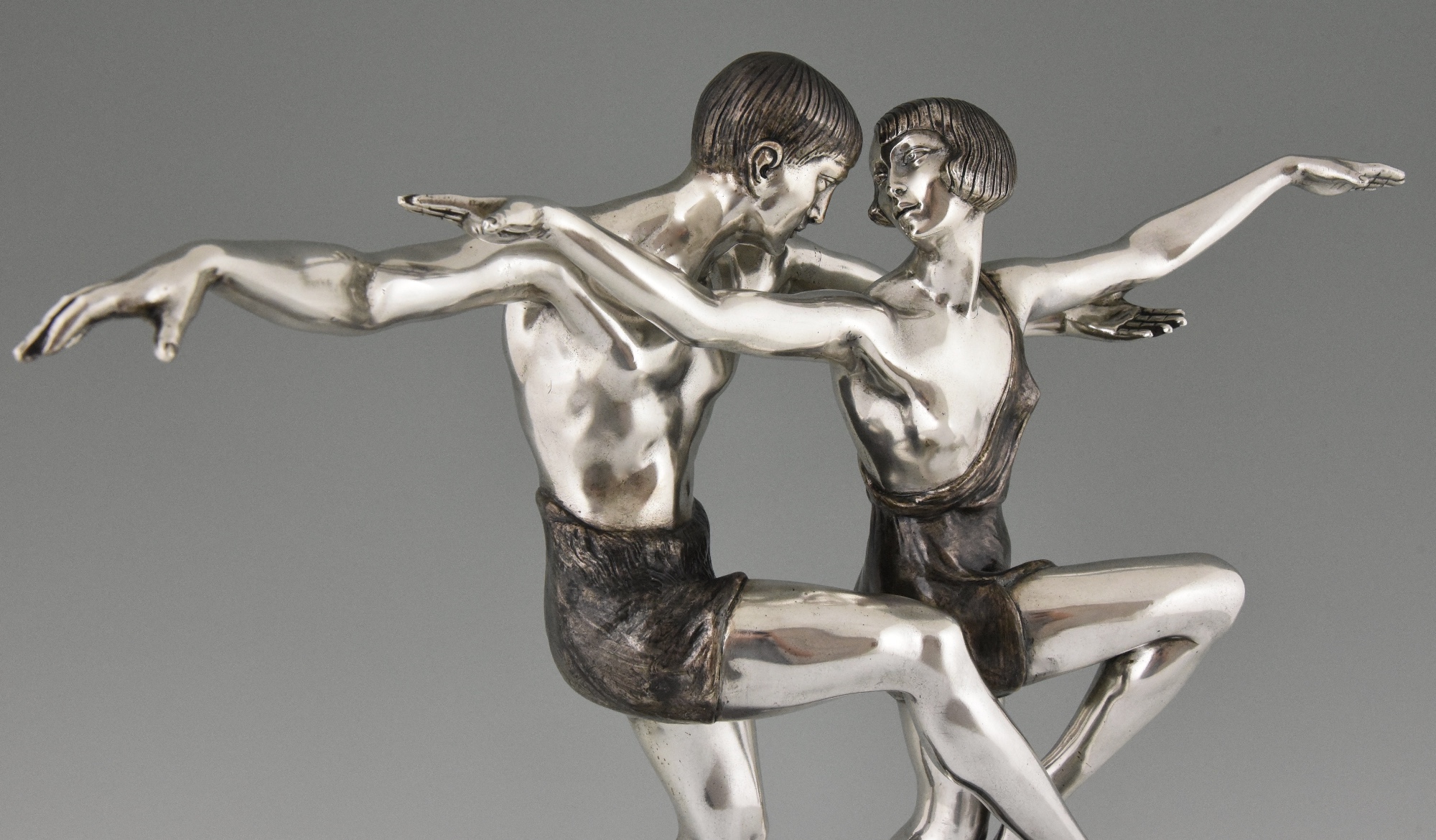 Art Deco silvered bronze sculpture of a dancing couple. Art Deco silvered bronze sculpture of a dancing couple.