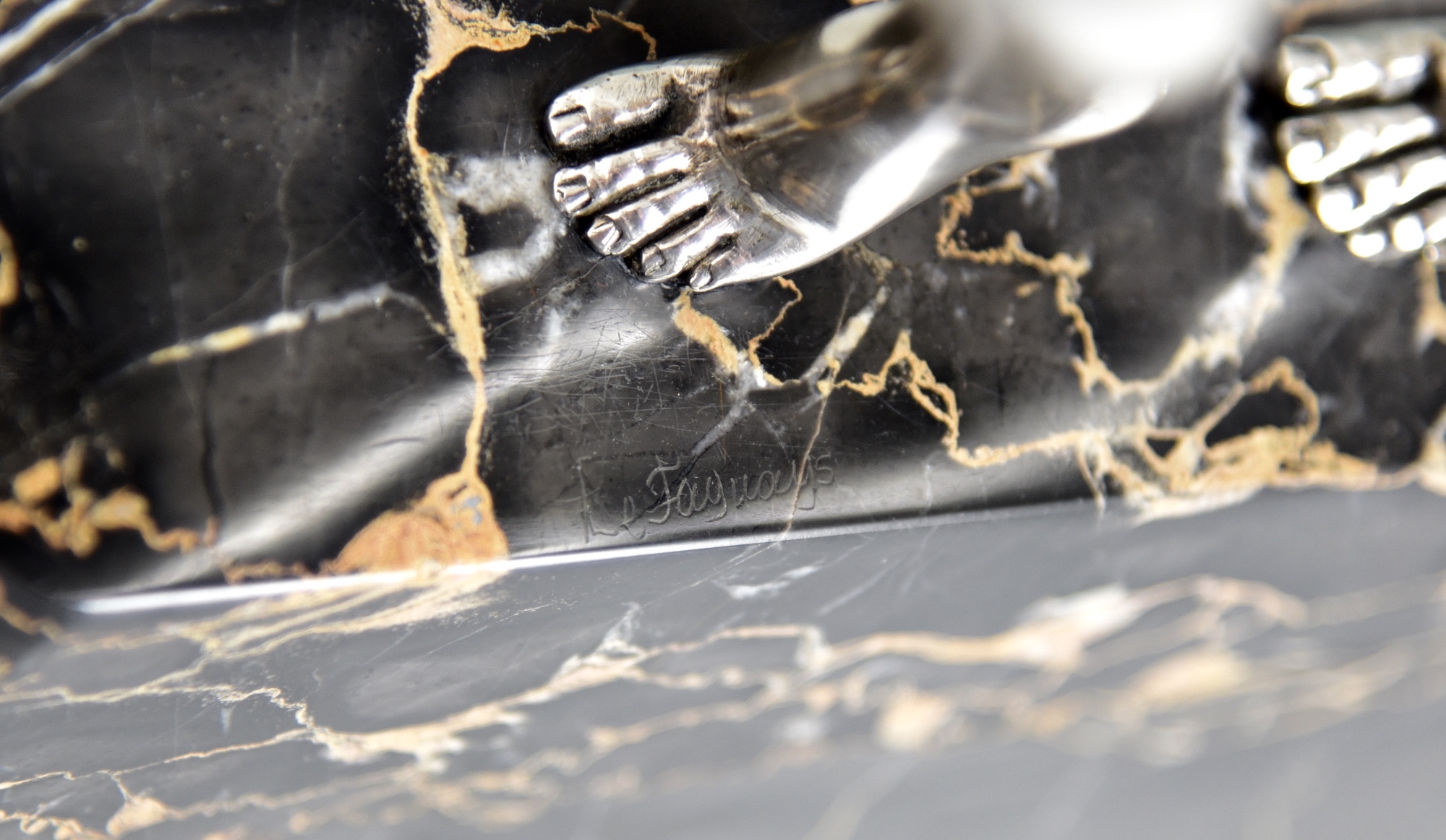 Art Deco silvered bronze sculpture of a dancing couple. Art Deco silvered bronze sculpture of a dancing couple.