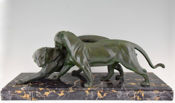 French Art Deco sculpture of two panthers.