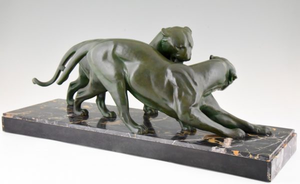 French Art Deco sculpture of two panthers.