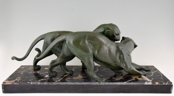 French Art Deco sculpture of two panthers.