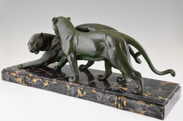 French Art Deco sculpture of two panthers.