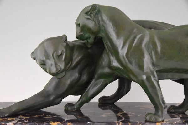 French Art Deco sculpture of two panthers.
