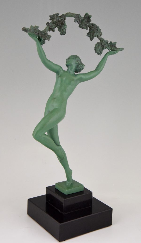 Art Deco sculpture of a nude with grapes