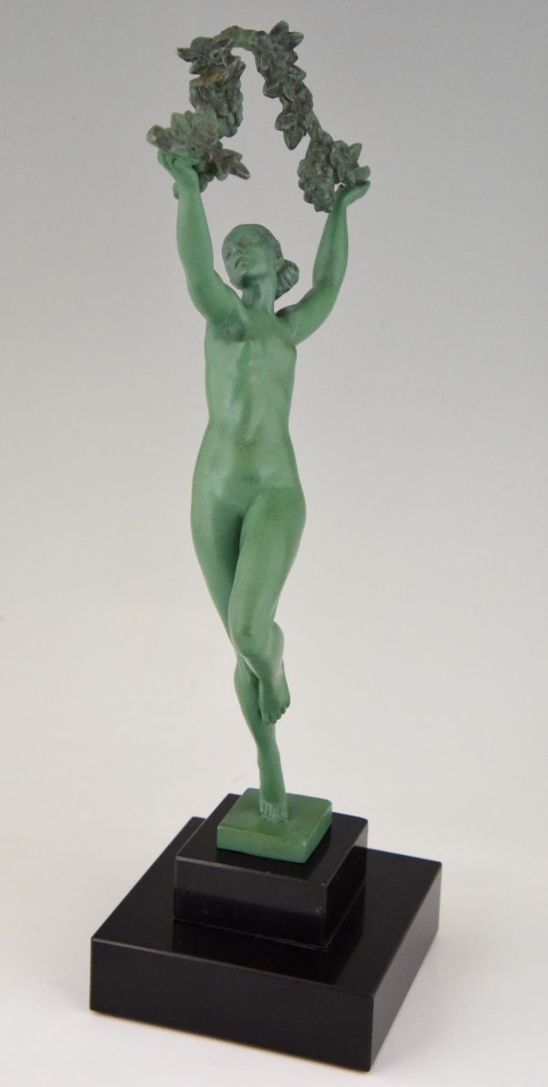 Art Deco sculpture of a nude with grapes