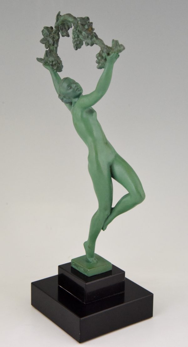 Art Deco sculpture of a nude with grapes