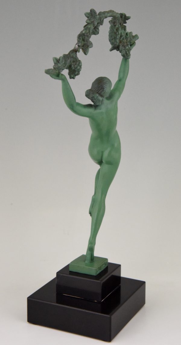 Art Deco sculpture of a nude with grapes
