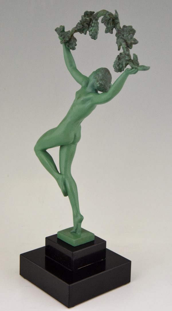 Art Deco sculpture of a nude with grapes