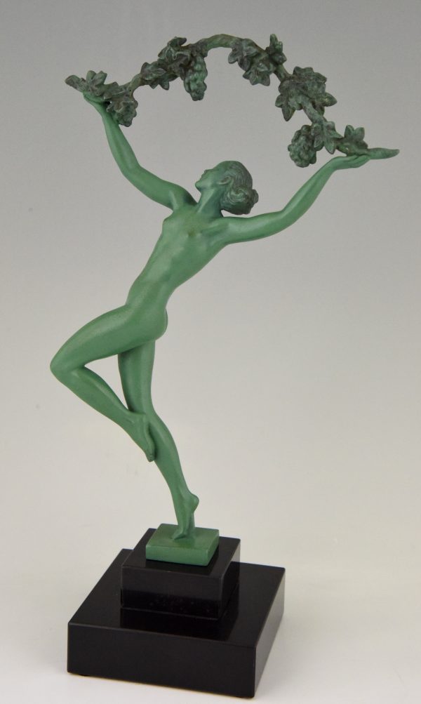 Art Deco sculpture of a nude with grapes