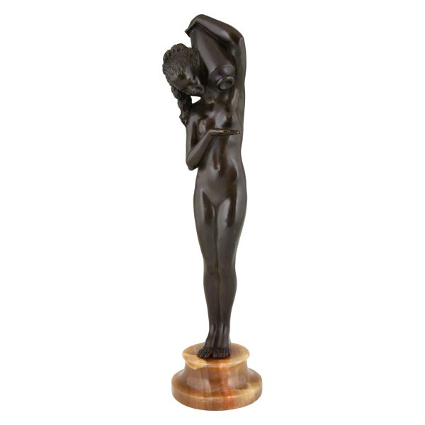 Art Deco bronze sculpture of a nude with jar